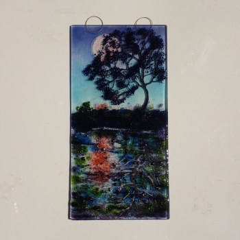 Wall hanging with 2 wire loops for hanging. Tree in moonlight reflected into a canal.