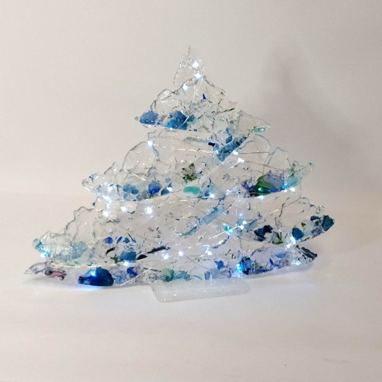 Large glass tree with clear and blue glass. Illuminated with LED lights.