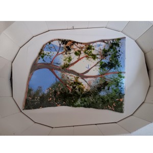 Tree branch section of glass in the kiln before firing with glass frit for the leaves.