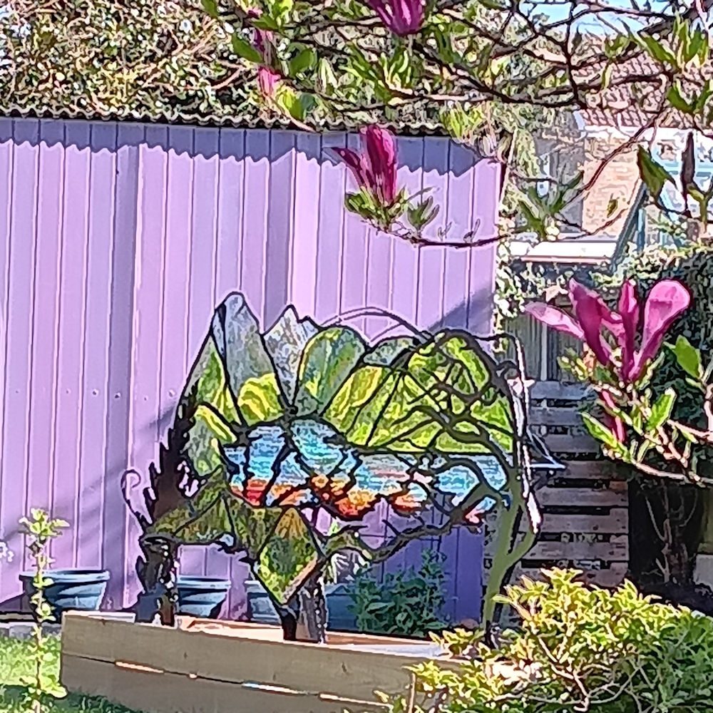 Garden Sculpture 'Kyles of Bute'. Black metal frame with coloured glass outlining the view of the loch.