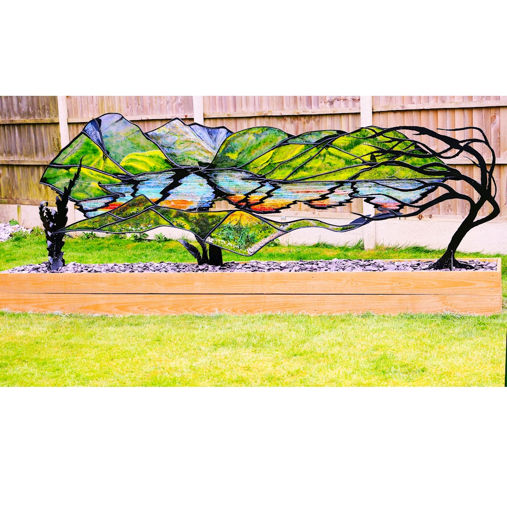 Garden Sculpture 'Kyles of Bute'. Black metal frame with coloured glass outlining the view of the loch.
