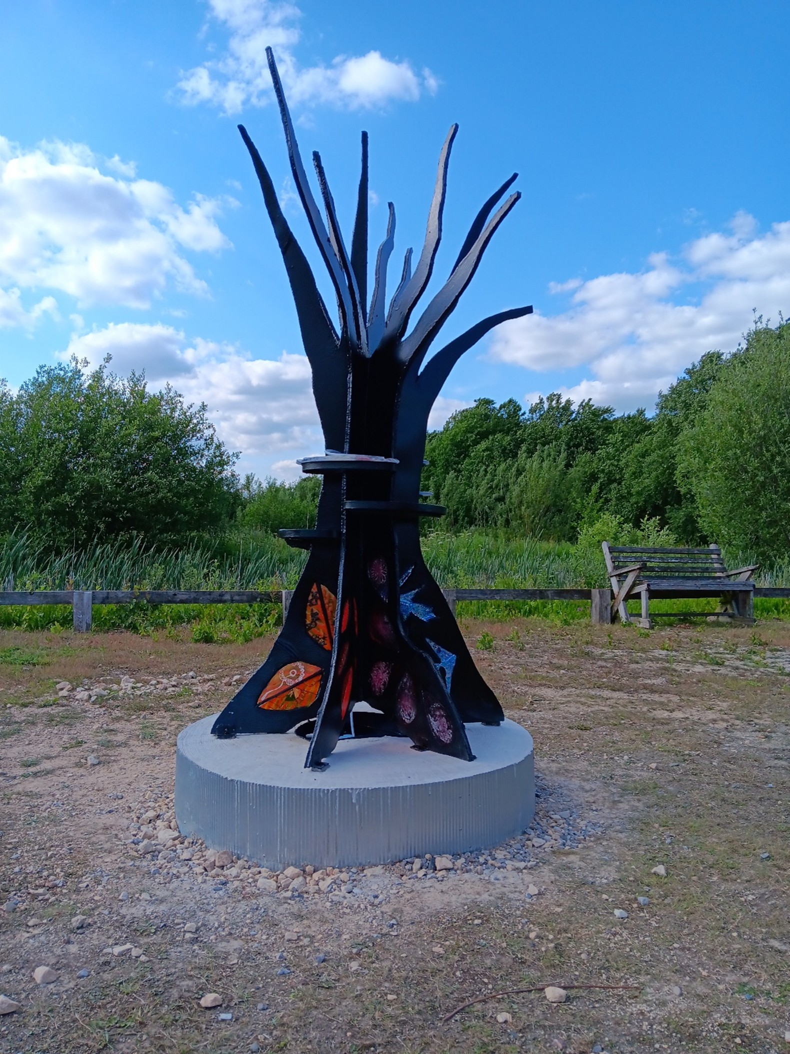 Black metal tree structure with coloured glass inserts