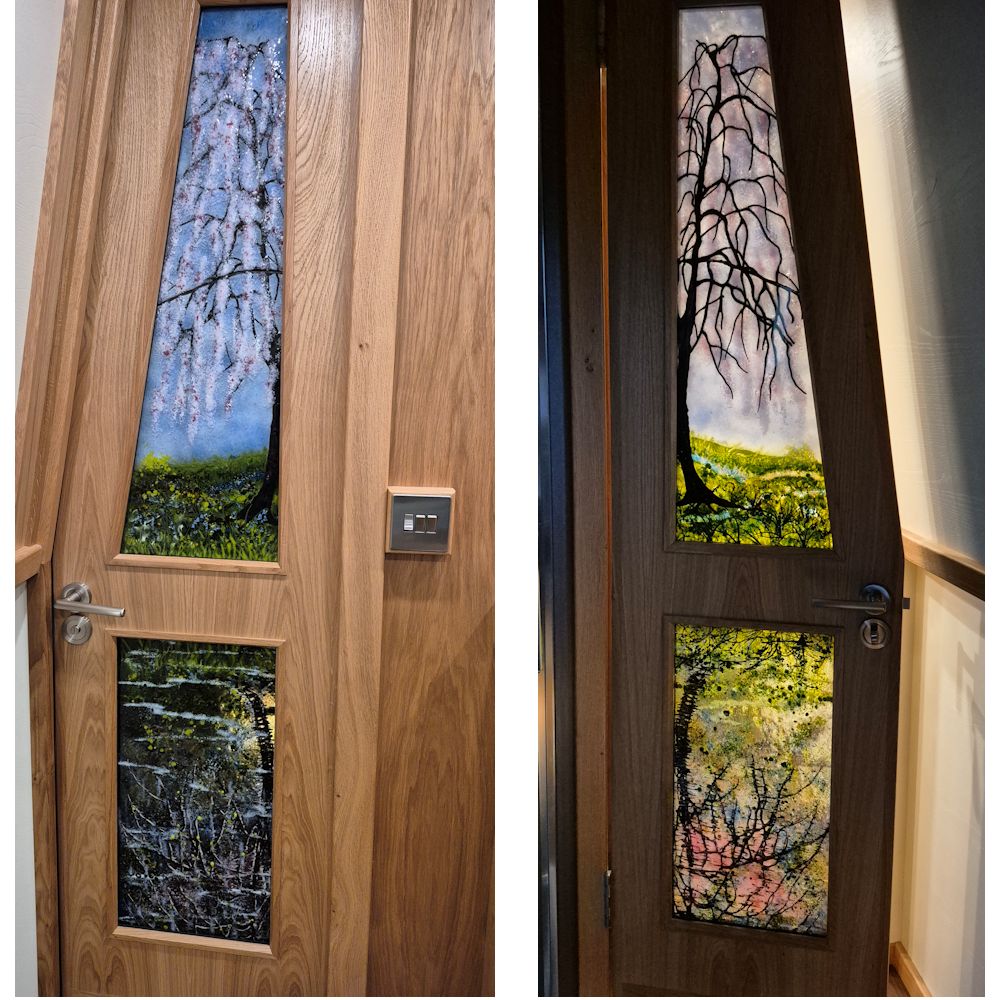 Fused glass boat interior door panels with a cherry tree in blossom reflected in the canal.